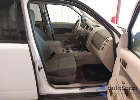 2009 Ford Escape Hybrid from USA, damaged, VIN 1FMCU49379KA42541